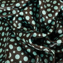 Load image into Gallery viewer, Spot Printed Satin Deadstock - Turquoise on Choc
